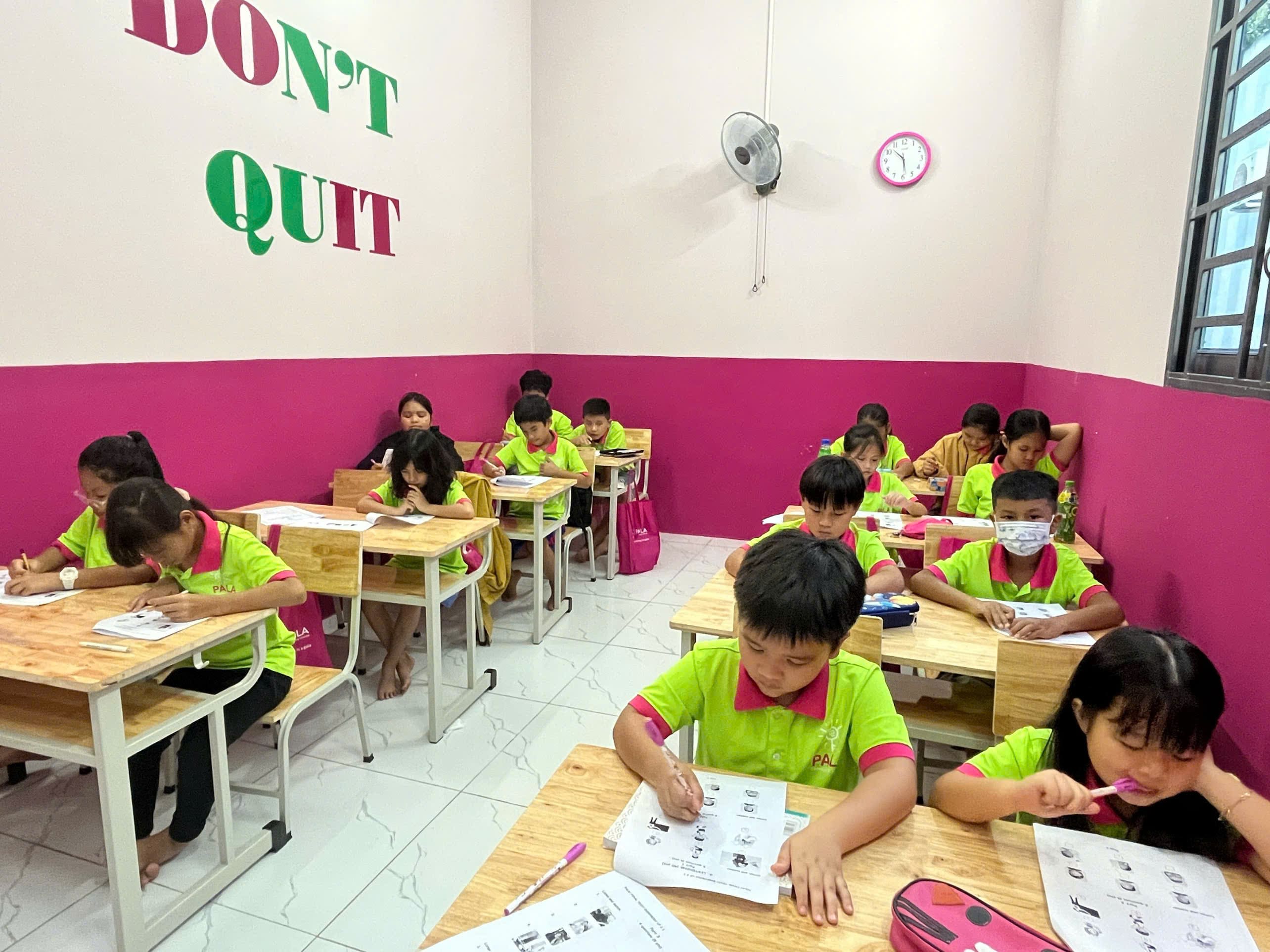 Team members collaborating around a whiteboard